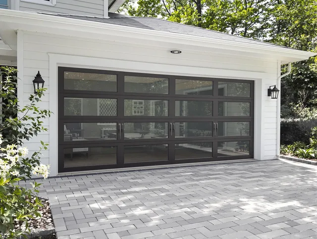 Akron Garage Door Repair design specialist presenting custom garage door options to Akron homeowner