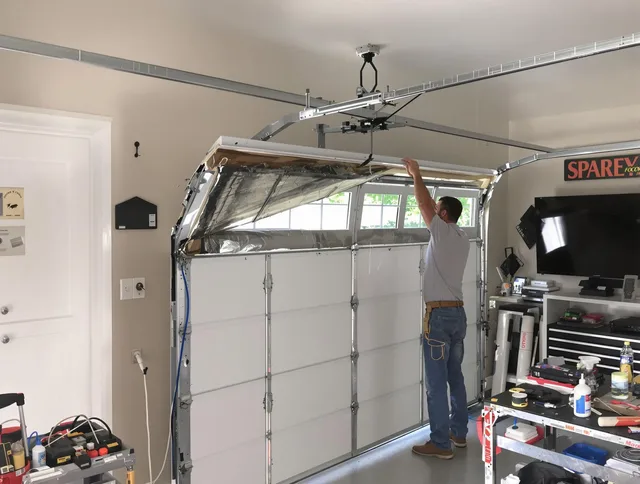 Garage door section replacement by Akron Garage Door Repair in Akron