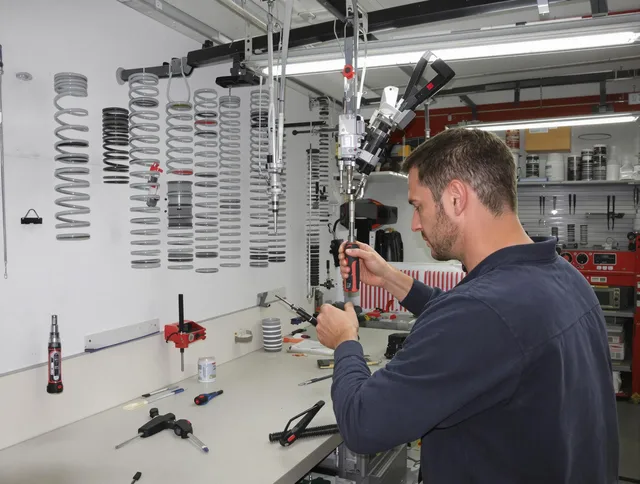 Akron Garage Door Repair safety certified technician performing precision spring replacement in Akron