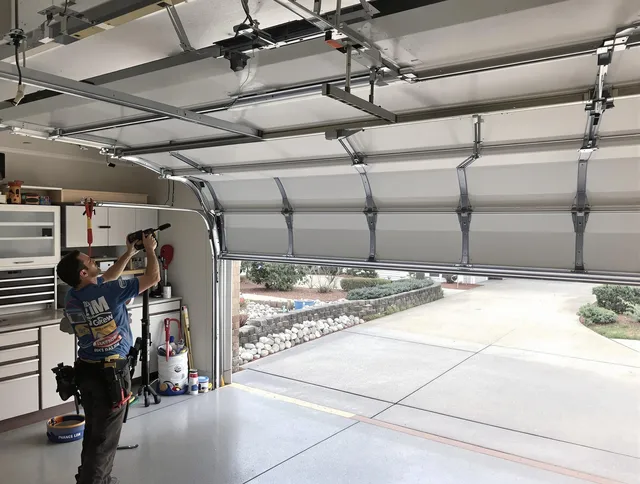 Garage door track repair service by Akron Garage Door Repair in Akron